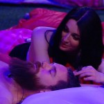 Rachelle plays with Kenny's hair