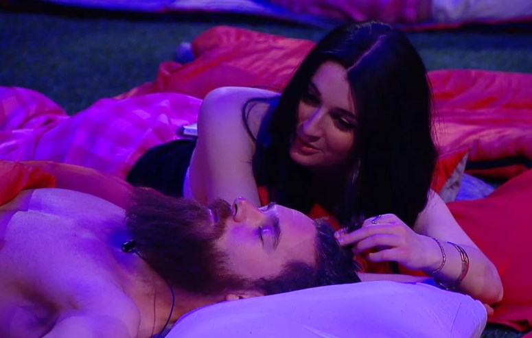Rachelle plays with Kenny’s hair