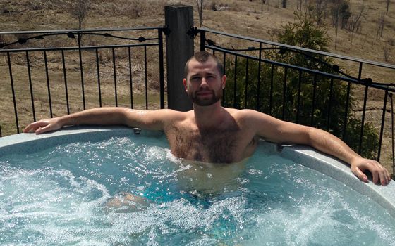 Arlie enjoys the hot tub at Big Brother Canada Jury House